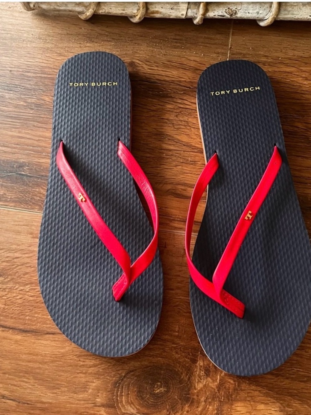 Tory Burch leather upper flip flop sandals. 
Worn once